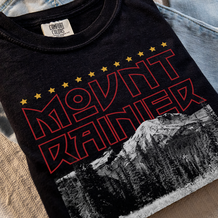 A Mount Rainier shirt in the style of band merch. Explore our Best Sellers collection featuring edgy, nature-themed art and apparel, including vintage national park shirts and hiking t-shirts that celebrate the outdoors!