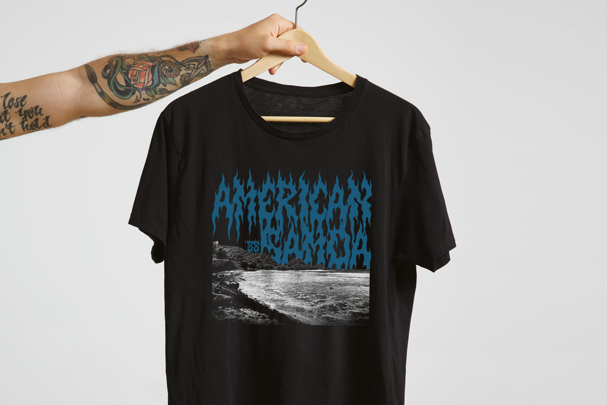 Black t-shirt with blue 'American Samoa' graphic design on a hanger against a white background