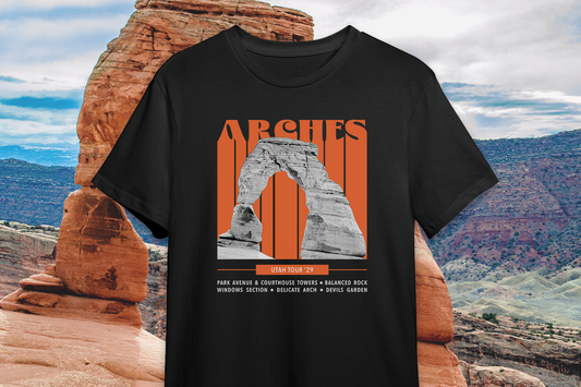 Black t-shirt with Arches National Park graphic design on a scenic background