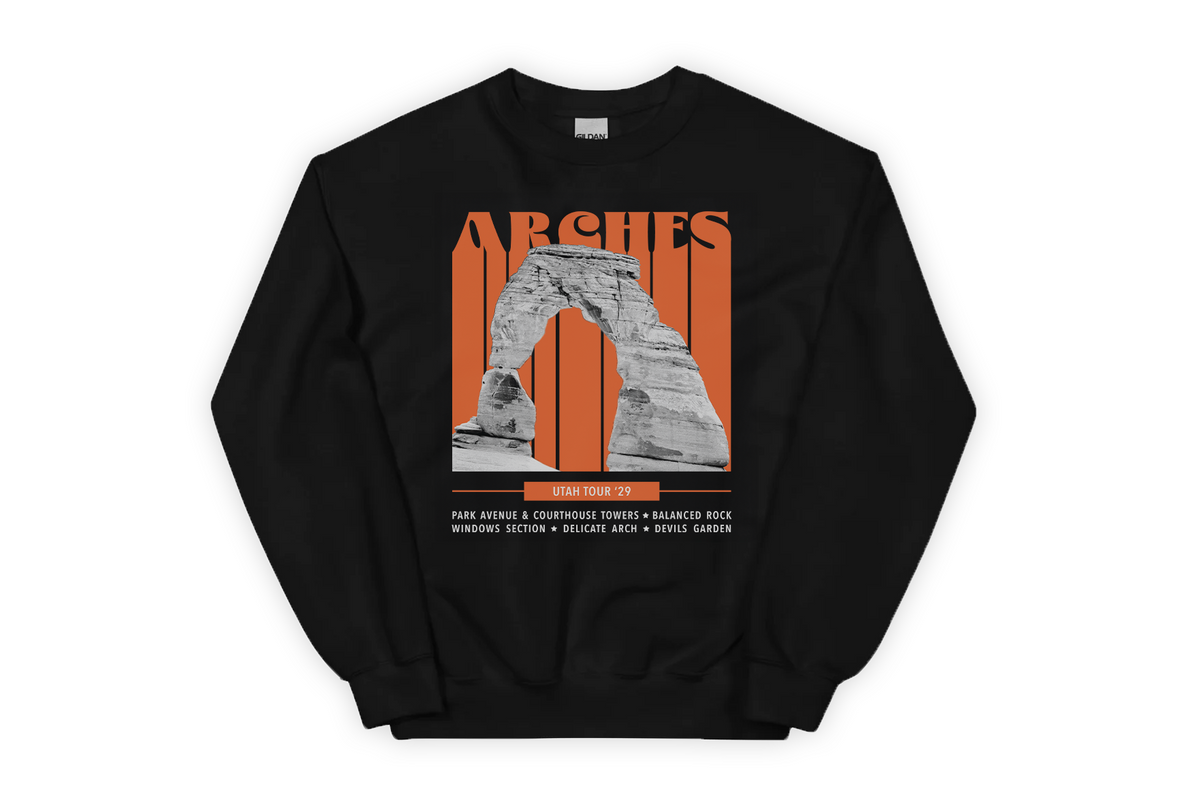 Black sweatshirt with a graphic design of Arches National Park on a white background