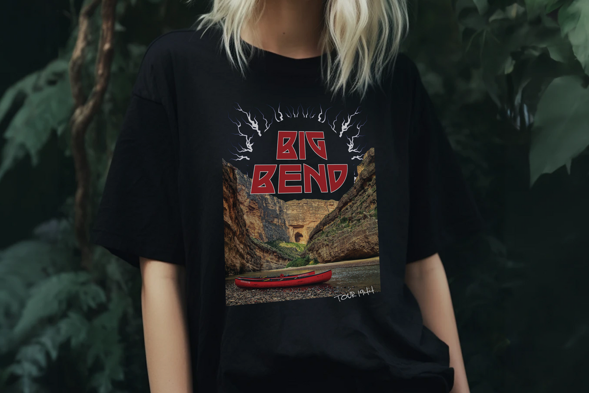 Person wearing a black t-shirt with 'Big Bend' graphic design against a dark background