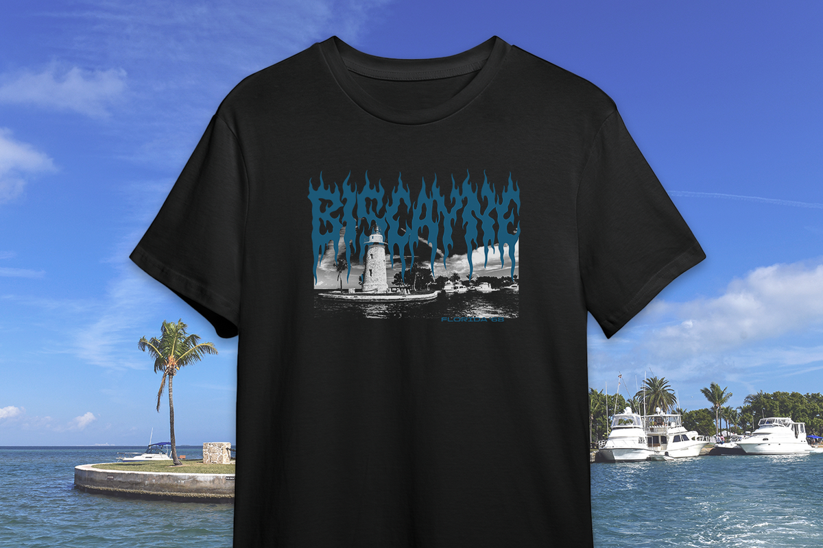 Black t-shirt with a 'Biscayne' graphic on a scenic background of a lighthouse and boats.