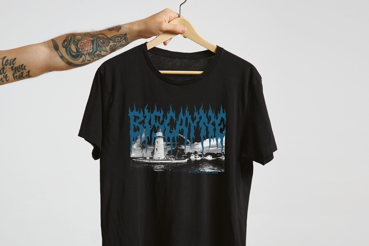 Black t-shirt with a 'Biscayne' graphic design on a hanger against a plain background