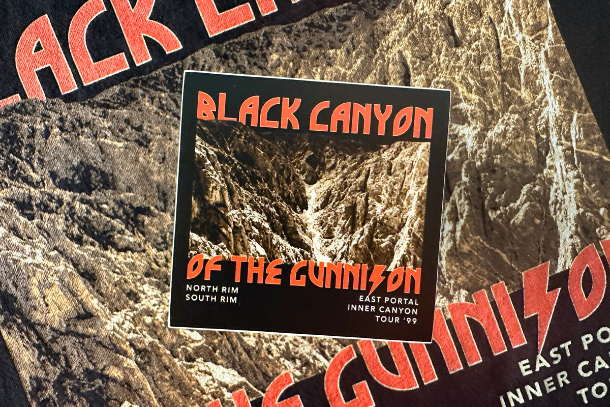 Sticker with a 'Black Canyon of the Gunnison' graphic design, on a textured background