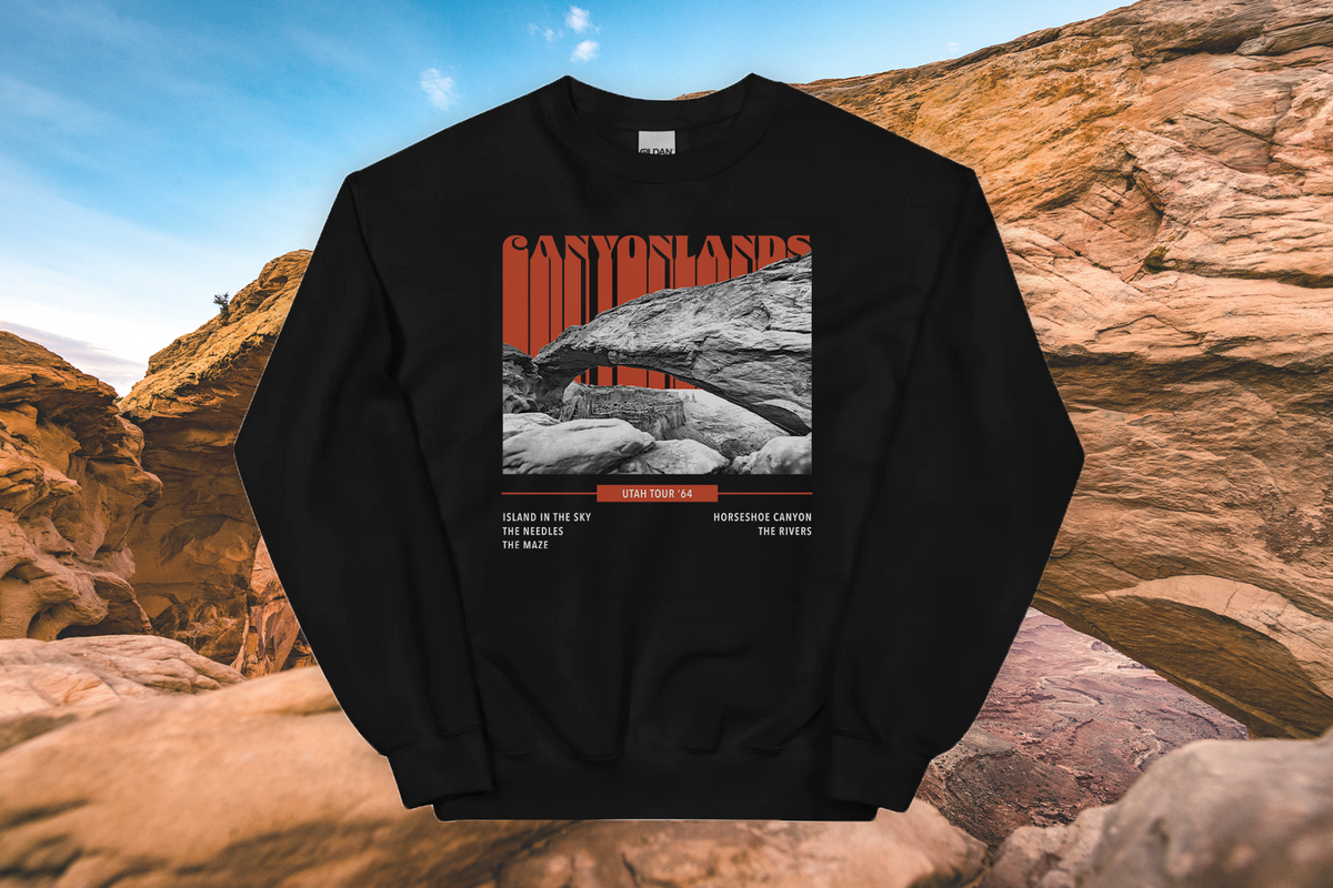Black sweatshirt with a 'Canyonlands' graphic design on a rocky landscape background