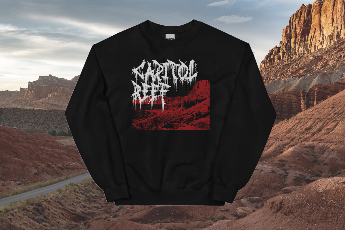 Black sweatshirt with 'Capitol Reef' graphic design in a desert landscape
