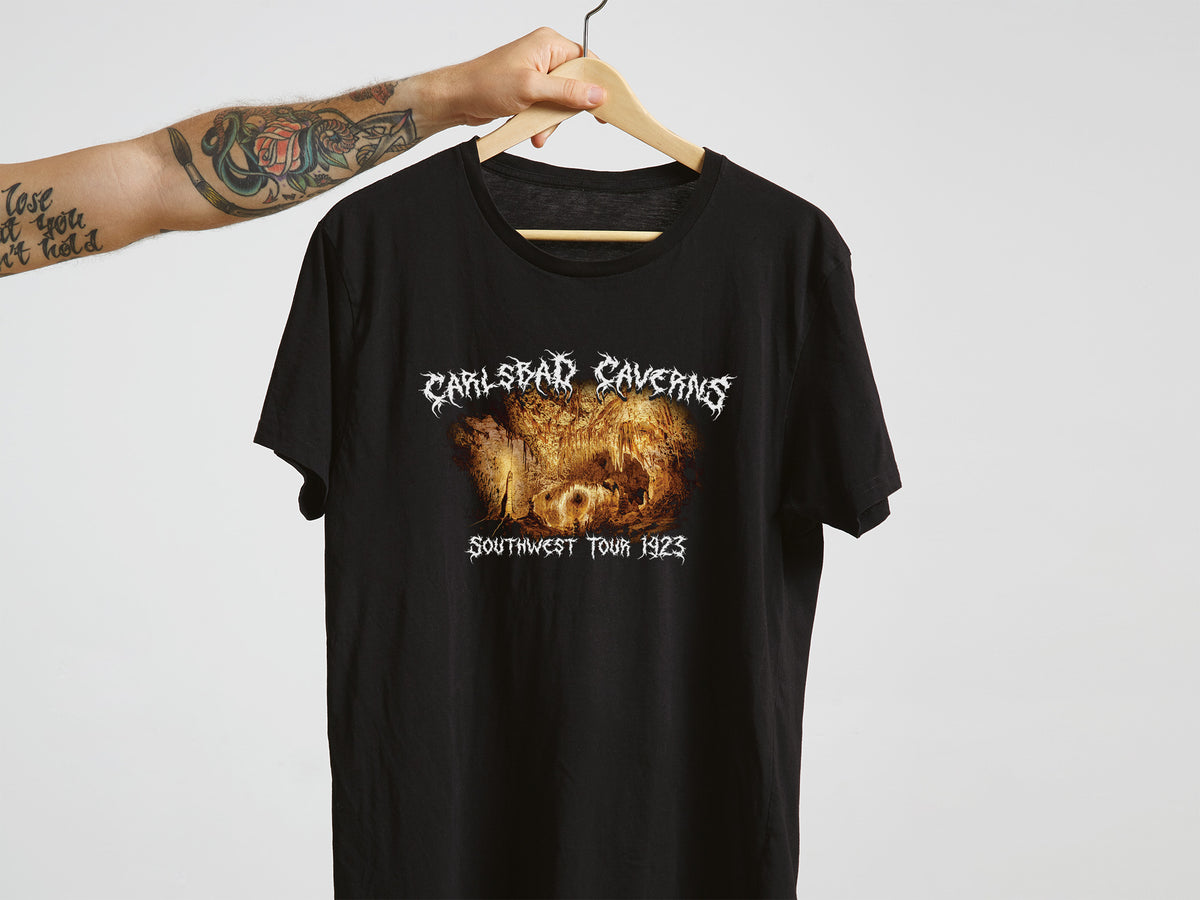 Black t-shirt with 'Carlsbad Caverns' graphic design and text on a white background