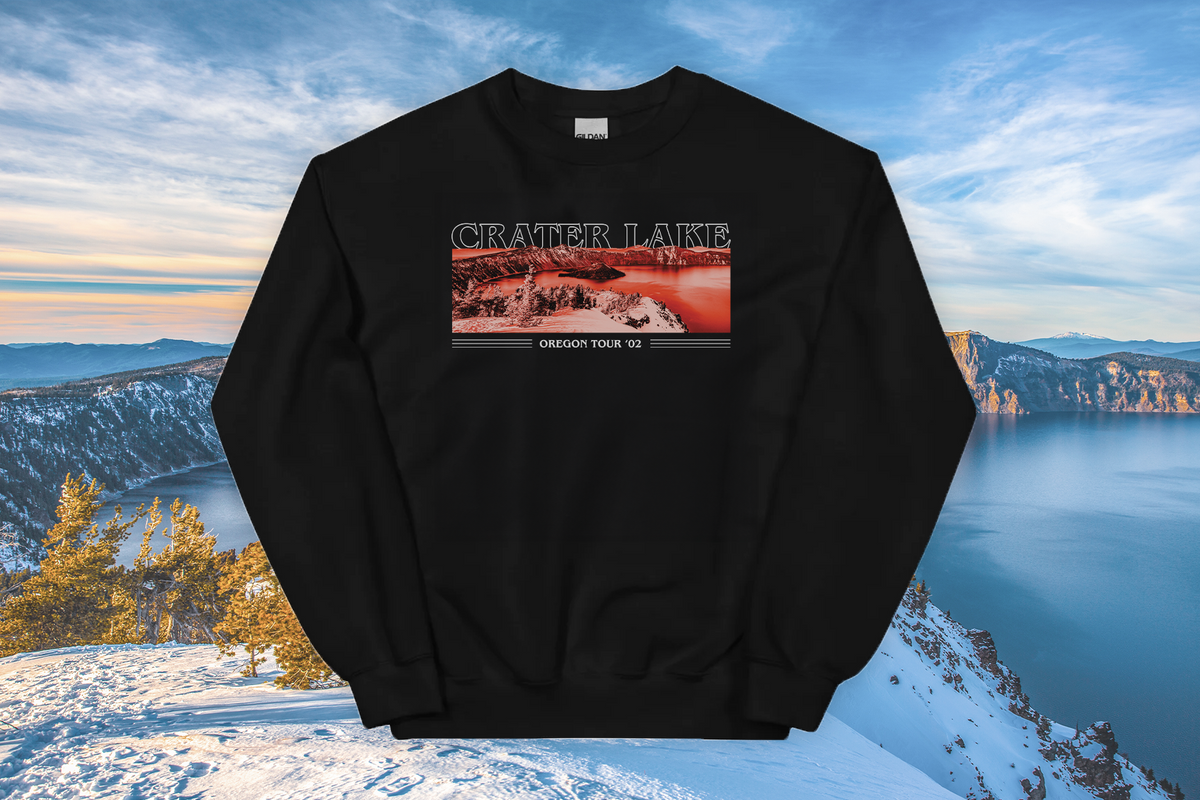 Black sweatshirt with Crater Lake design against a scenic background