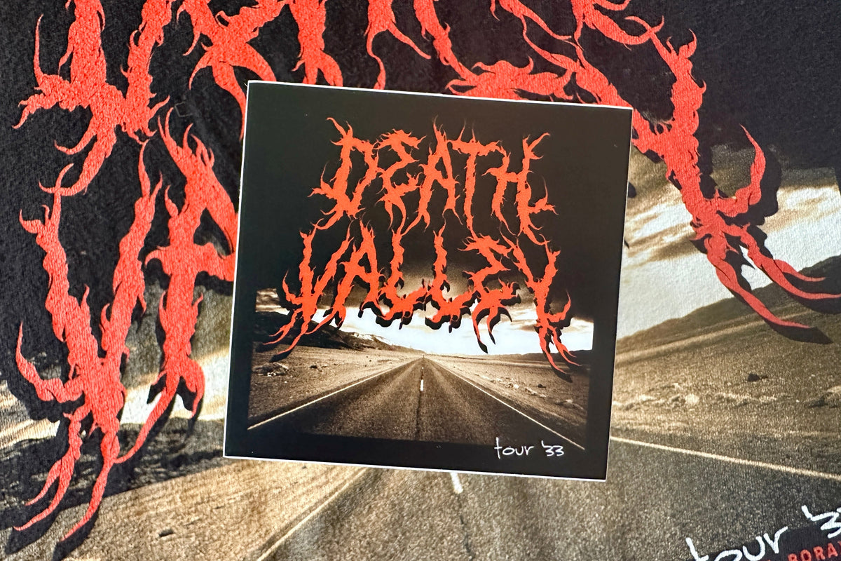 Sticker with a 'Death Valley' graphic design, on a textured background