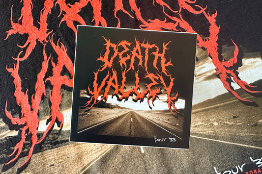 Sticker with a 'Death Valley' graphic design, on a textured background