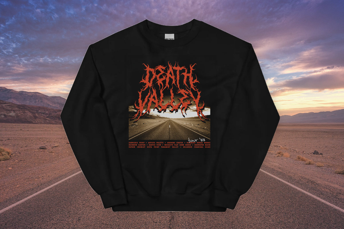 Black sweatshirt with 'Death Valley' graphic design on a desert road background