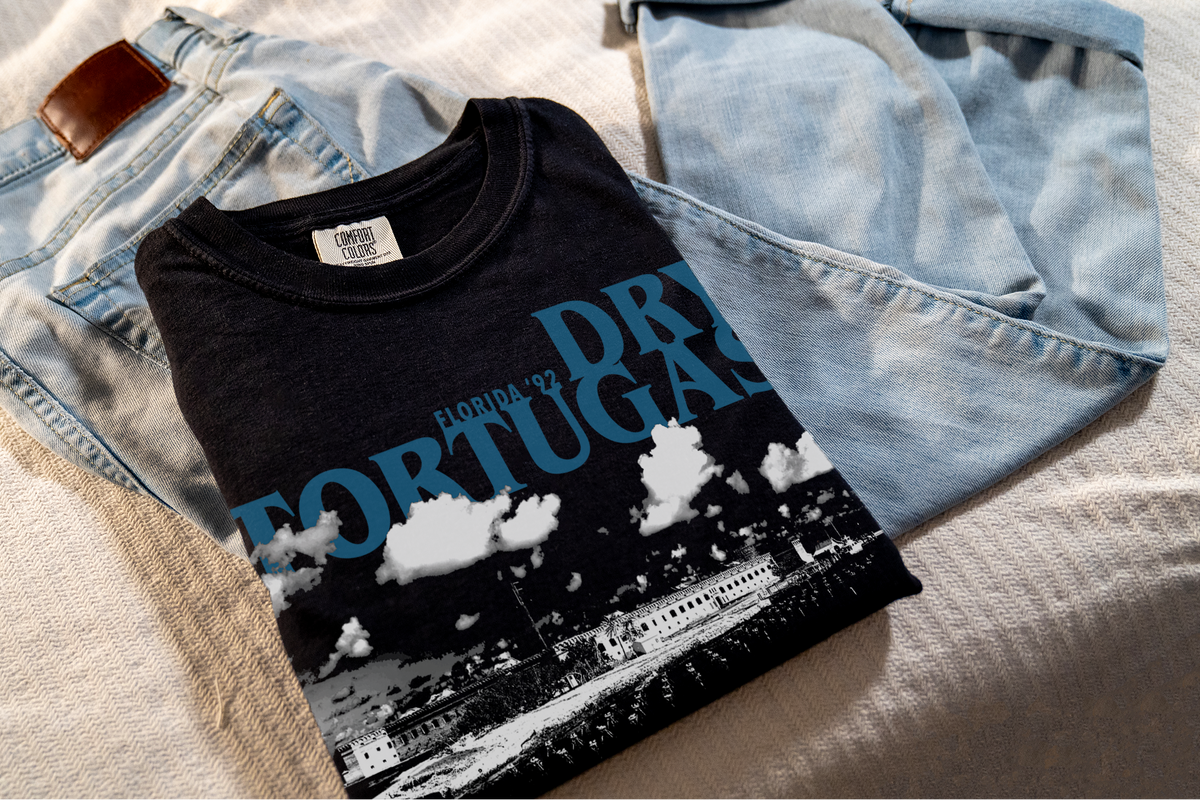 Black t-shirt with 'Dry Tortugas' design on denim jeans