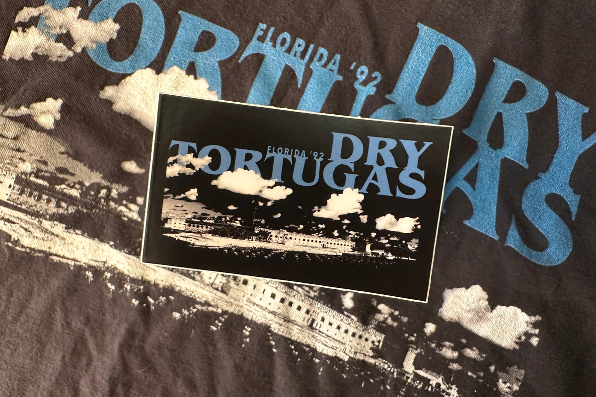 'Dry Tortugas' sticker on a textured background.