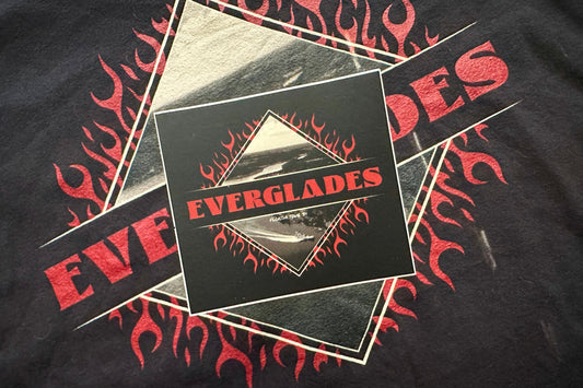 Black sticker with red 'Everglades' text and flame design on a dark background