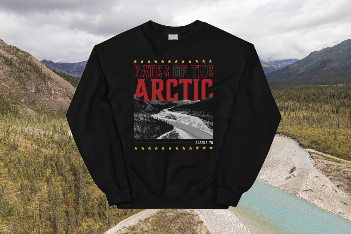Black sweatshirt with 'Gates of the Arctic' design over a scenic background