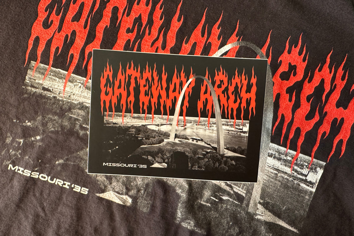 'Gateway Arch' sticker on a textured background.