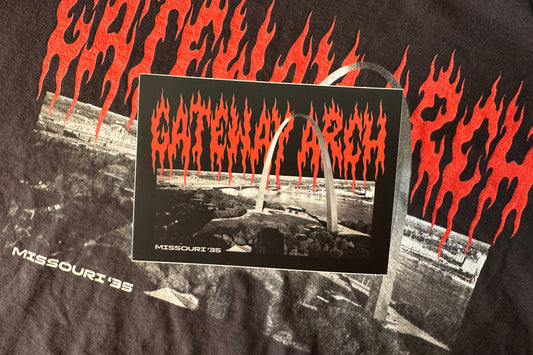 'Gateway Arch' sticker on a textured background.