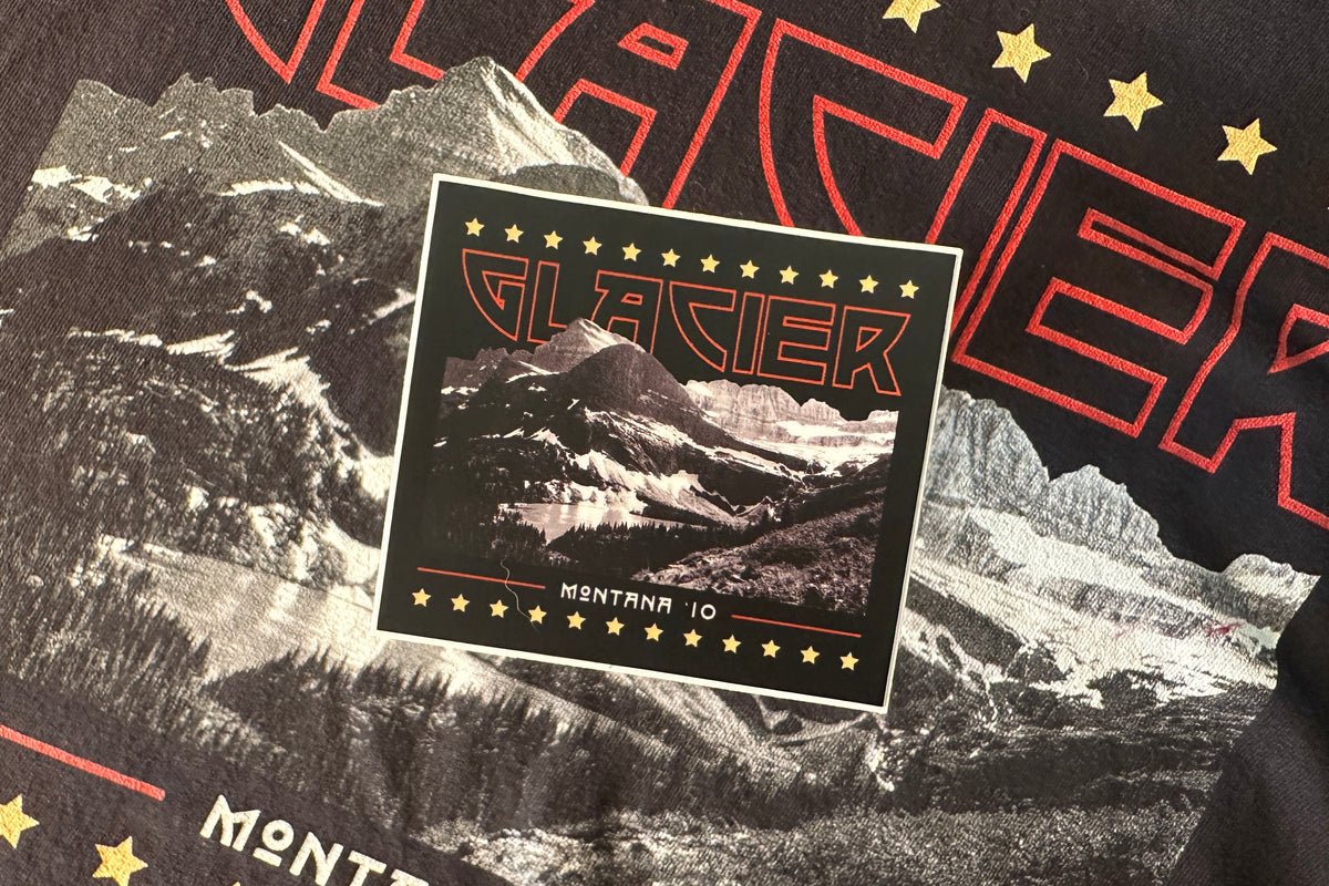 'Glacier' sticker on a textured background.