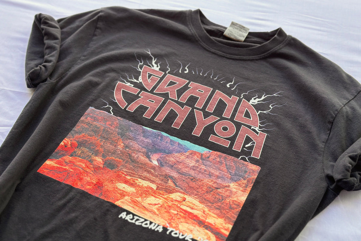Black t-shirt with Grand Canyon graphic design on a white background