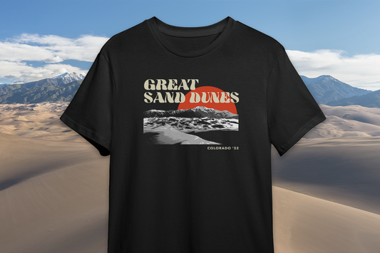 Black t-shirt with 'Great Sand Dunes' graphic design against a desert background