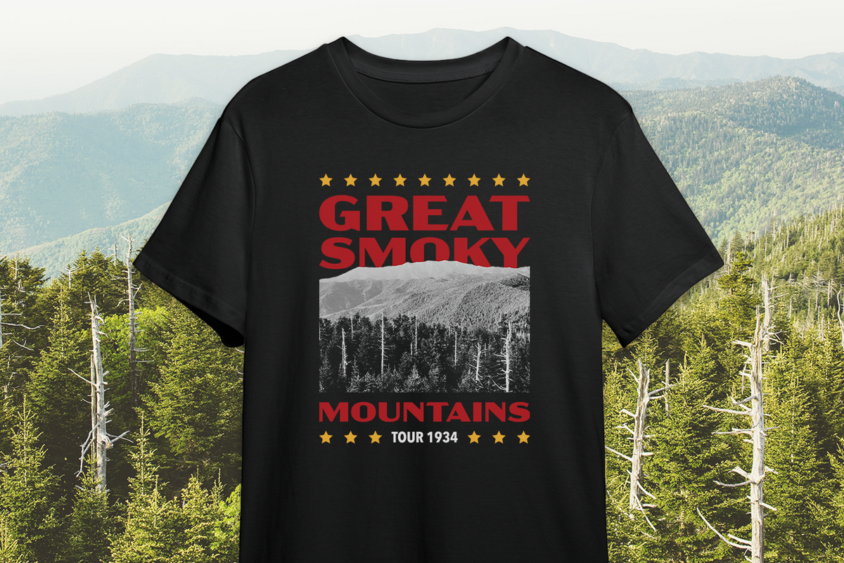 Black t-shirt with 'Great Smoky Mountains Tour 1934' design against a mountainous background