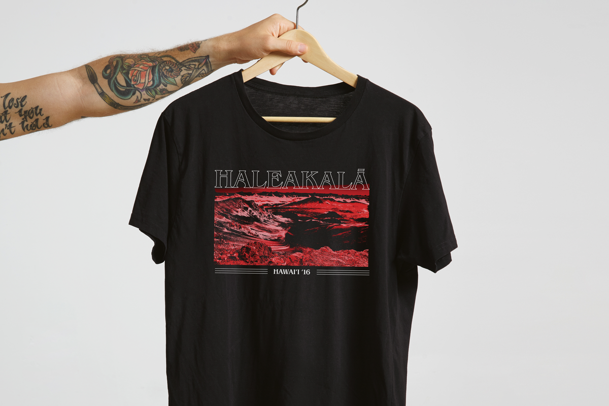 Black t-shirt with red 'Haleakala' graphic design and text on a white background