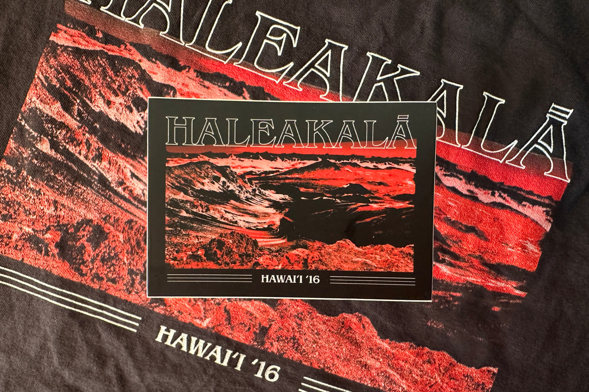Haleakala sticker with red and black design.