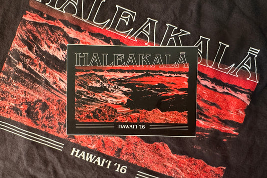 Haleakala sticker with red and black design.