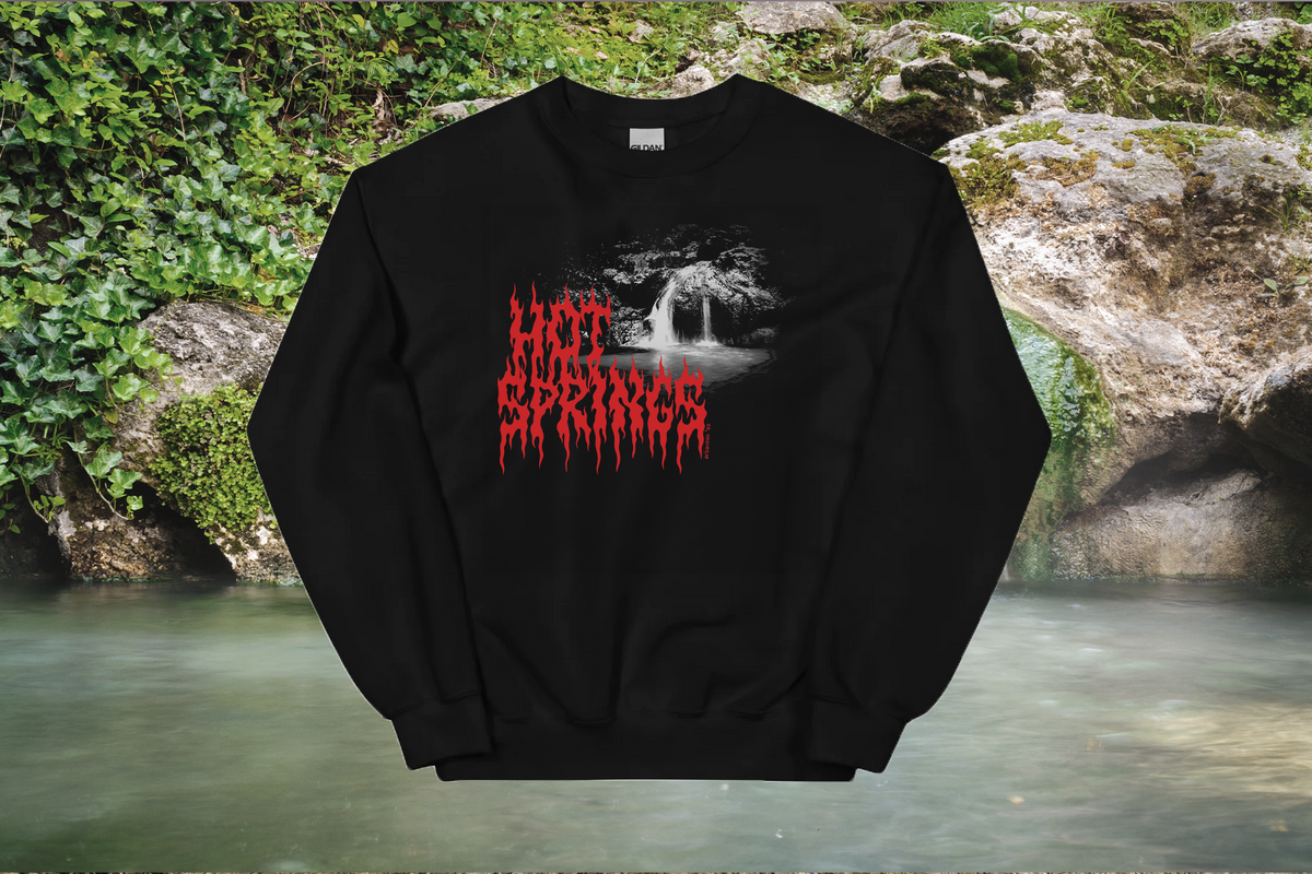 Black sweatshirt with red 'Hot Springs' text and graphic design on a natural background
