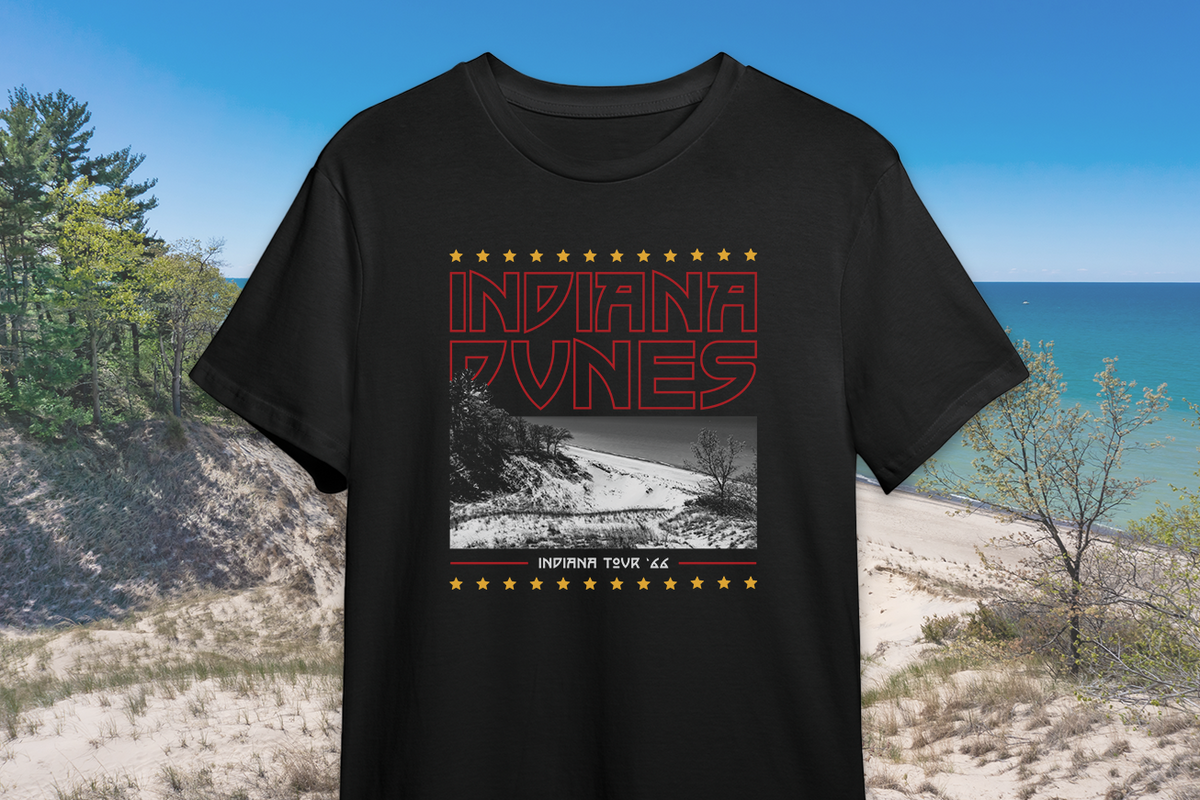 Black t-shirt with 'Indiana Dunes' graphic design on a scenic background