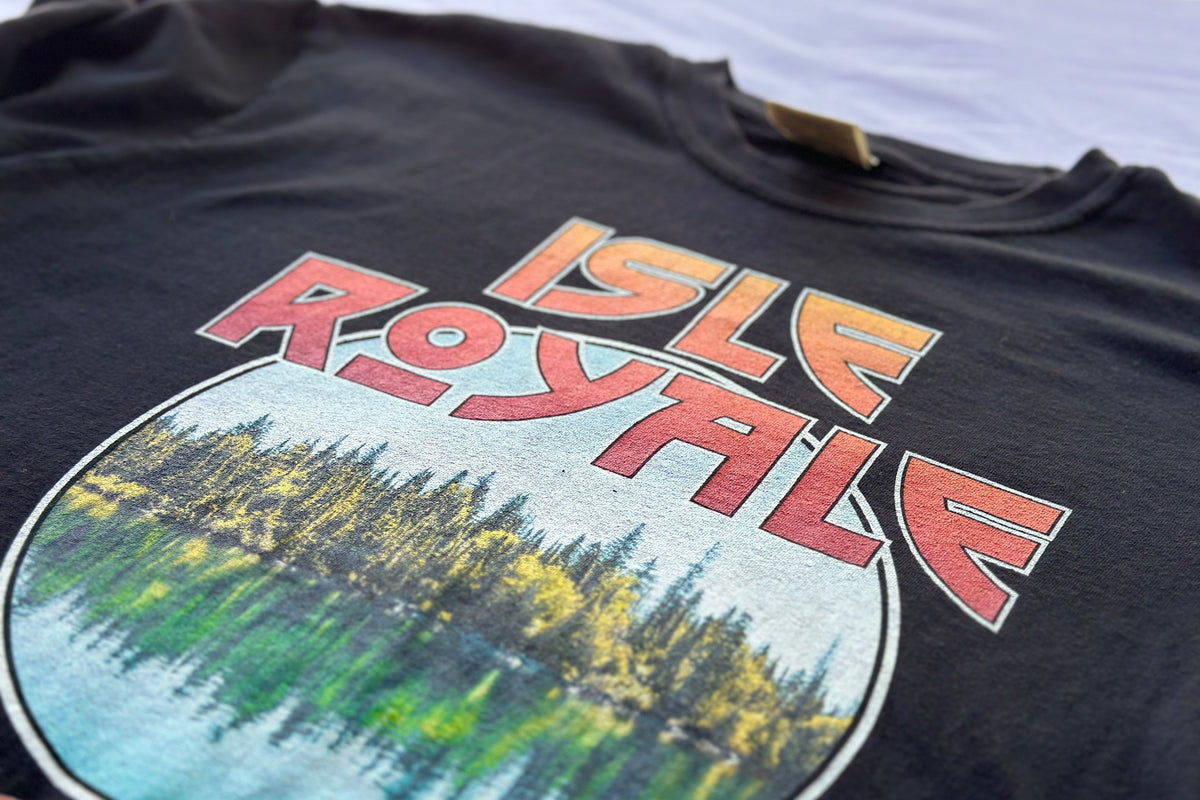 T-shirt with 'Isle Royale' graphic design on a black background