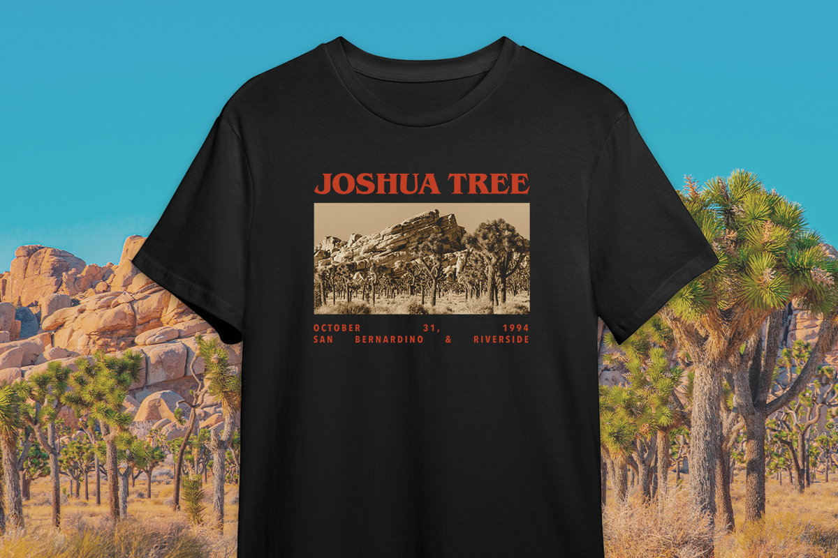 Black t-shirt with Joshua Tree graphic design on a desert background