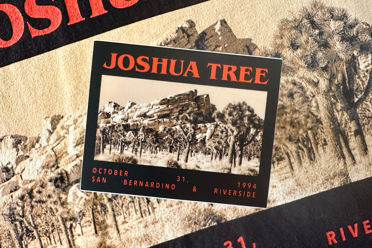 Sticker with a 'Joshua Tree' graphic design, on a textured background