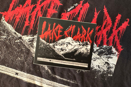 'Lake Clark' sticker on a textured background.