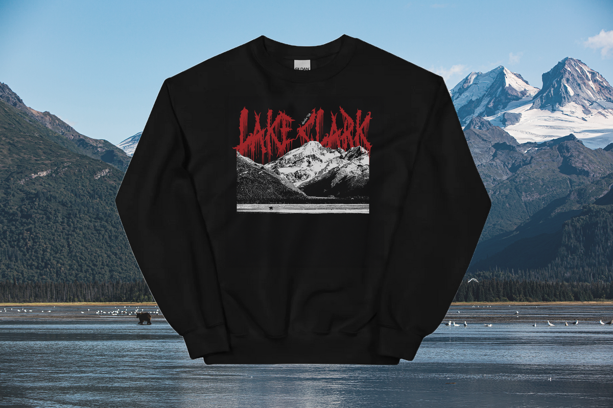 Black sweatshirt with 'Lake Clark' graphic in front of a mountainous landscape