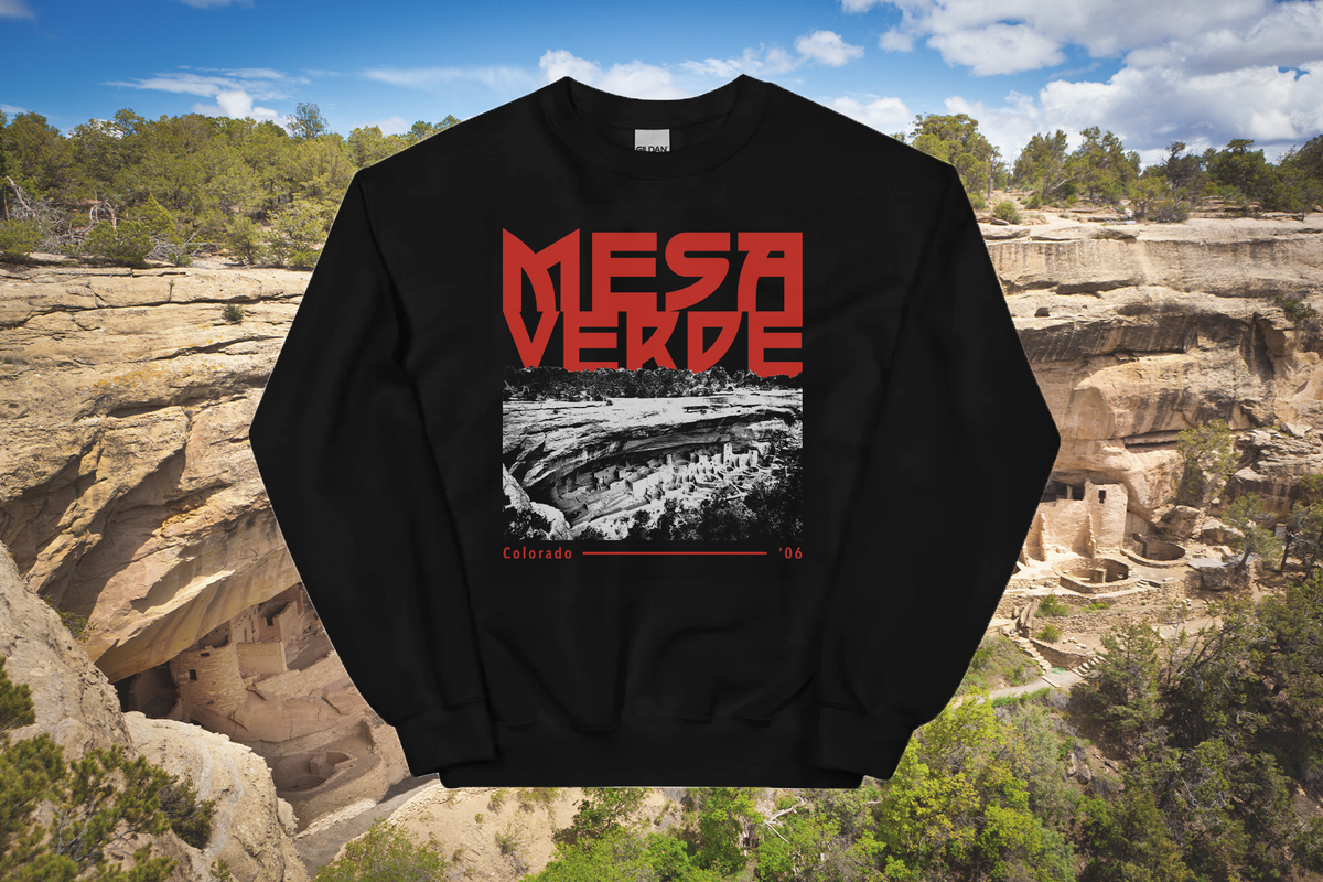 Black sweatshirt with 'Mesa Verde' design in red and white text, set against a backdrop of the Mesa Verde National Park.