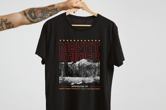 Black t-shirt with Mount Rainier design on a hanger against a white background