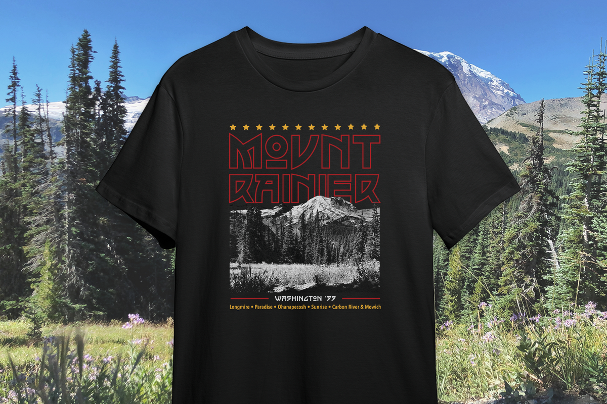 Black t-shirt with Mount Rainier design in a natural setting