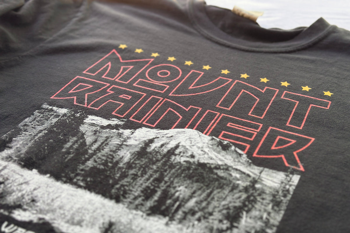 T-shirt with 'Mount Rainier' graphic and text on a dark background