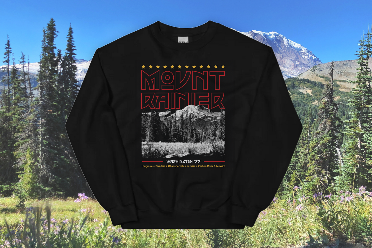 Black sweatshirt with Mount Rainier graphic in a natural setting