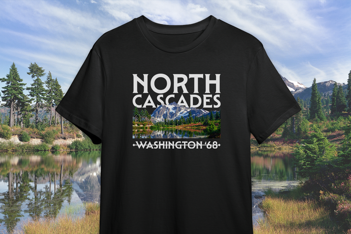 Black t-shirt with 'North Cascades' design on a scenic background