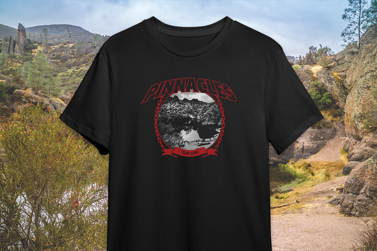 Black t-shirt with a 'Pinnacles' graphic design in a natural landscape