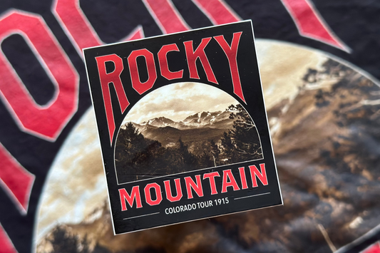 Sticker with 'Rocky Mountain'' design on a blurred background 