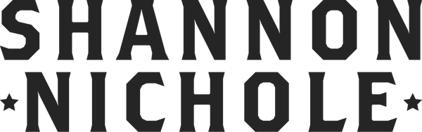 Black text depicting the words 'Shannon Nichole' with stars