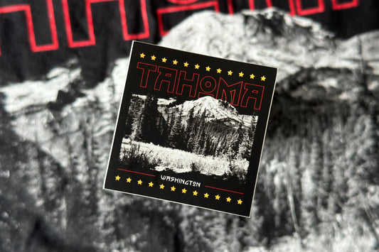 Sticker for 'Tahoma' with mountain graphic and star accents on a textured background