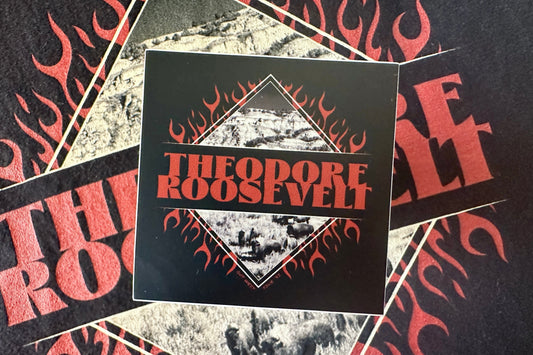 Sticker with 'Theodore Roosevelt' text on a black background, surrounded by a textured background