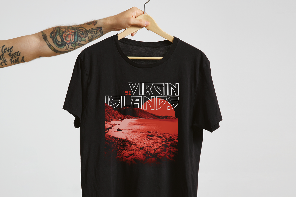 Black t-shirt with 'Virgin Islands' graphic design on a hanger against a white background