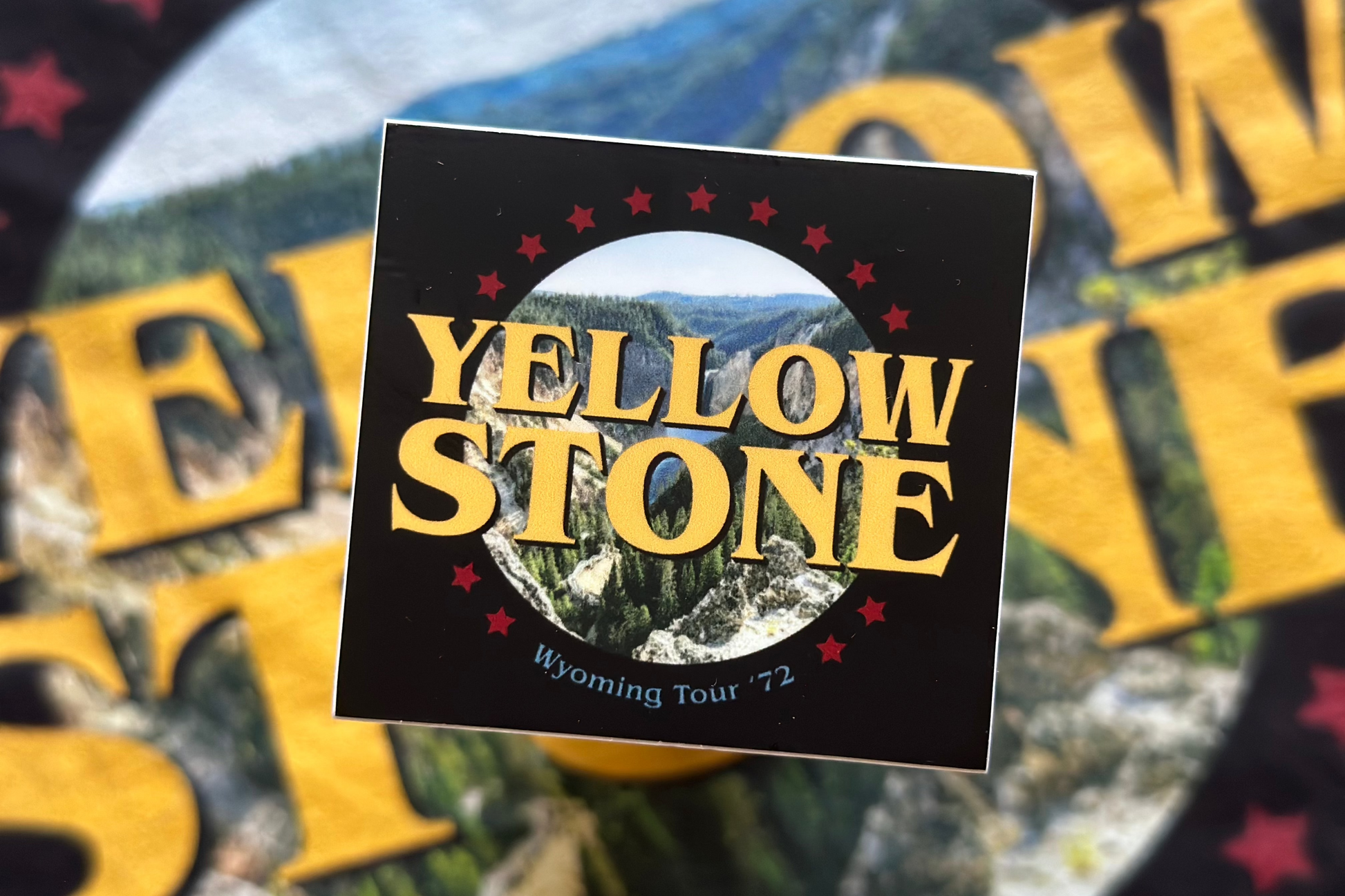 Yellowstone sticker with scenic background