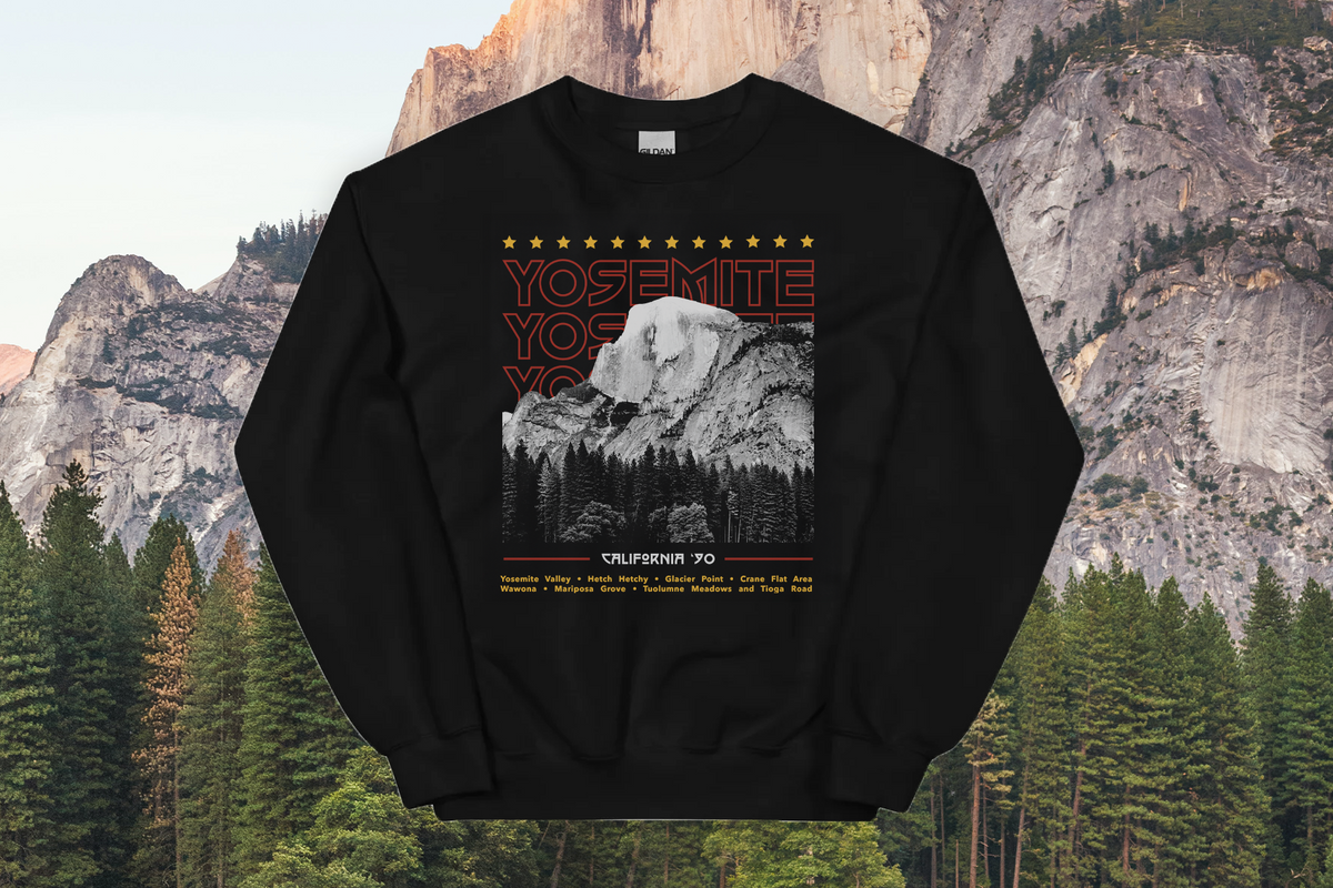 Black sweatshirt with Yosemite design against a mountainous background