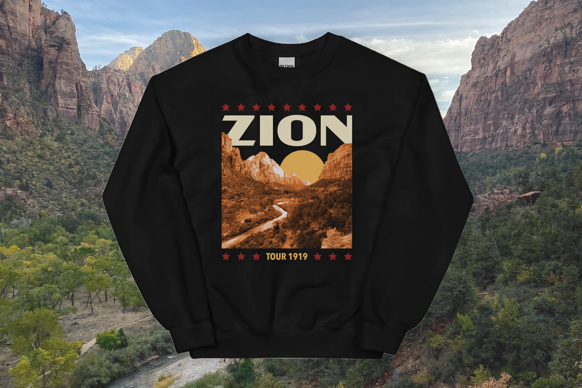 Black sweatshirt with Zion National Park design against a scenic background